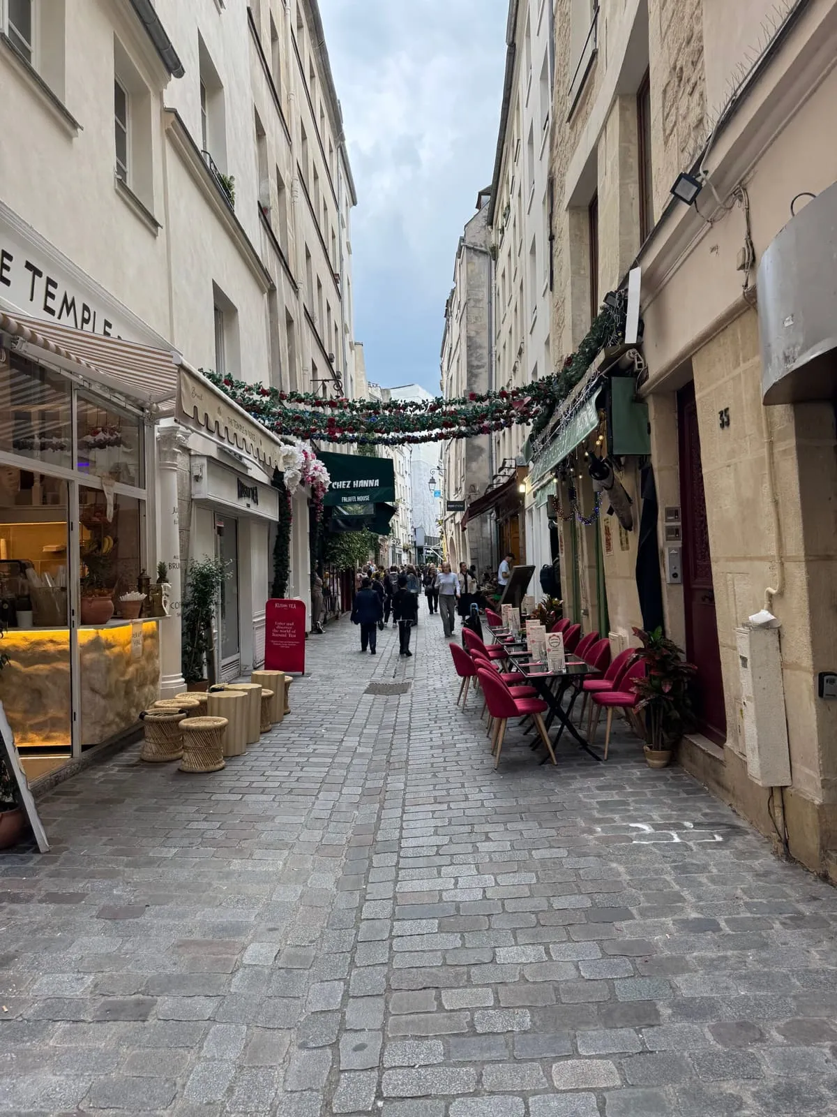 Rue des Rosiers in the Marais with its shops and café terraces