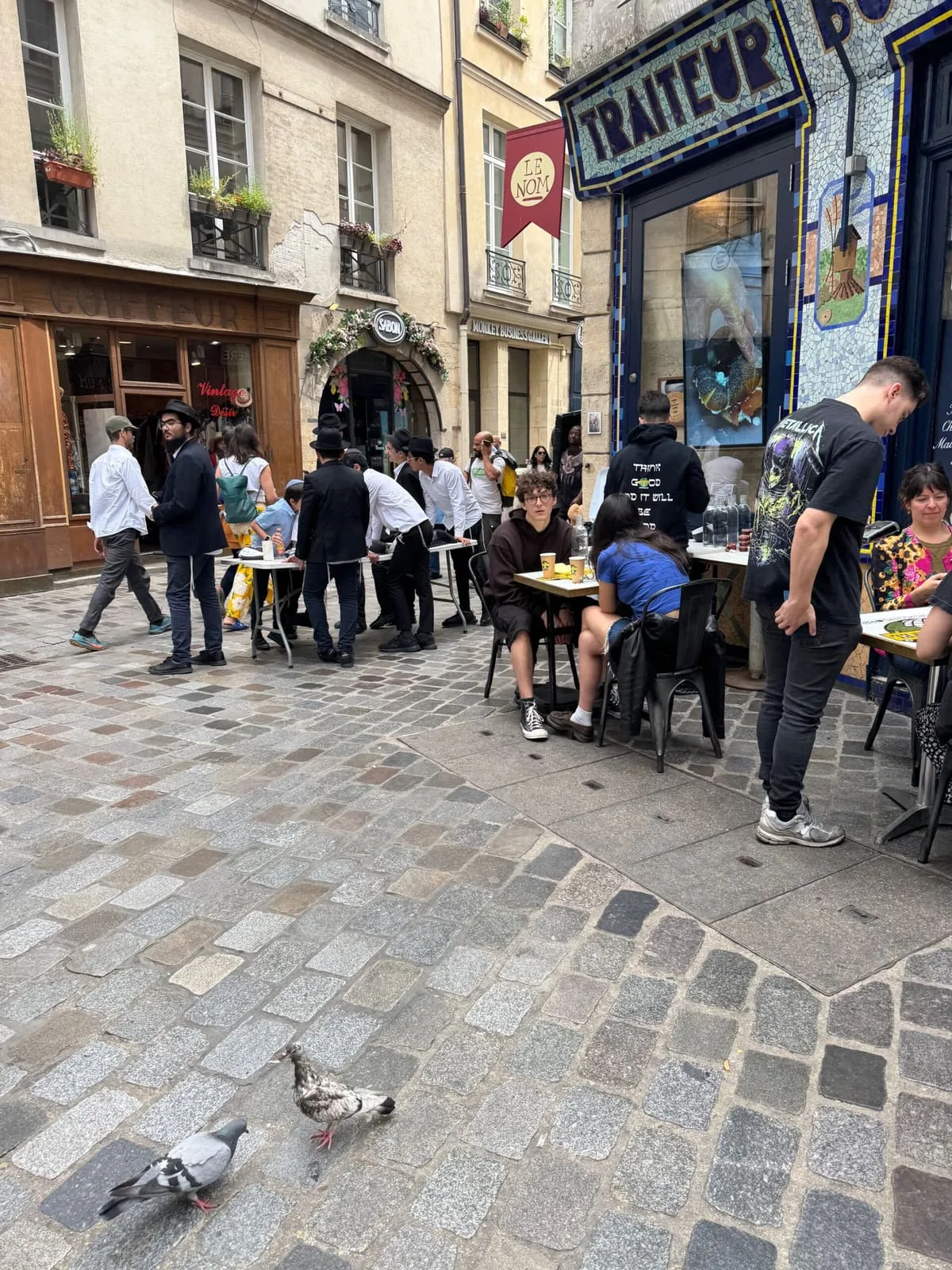 Terrace tables outside a kosher traiteur in the old Jewish quarter of the Marais